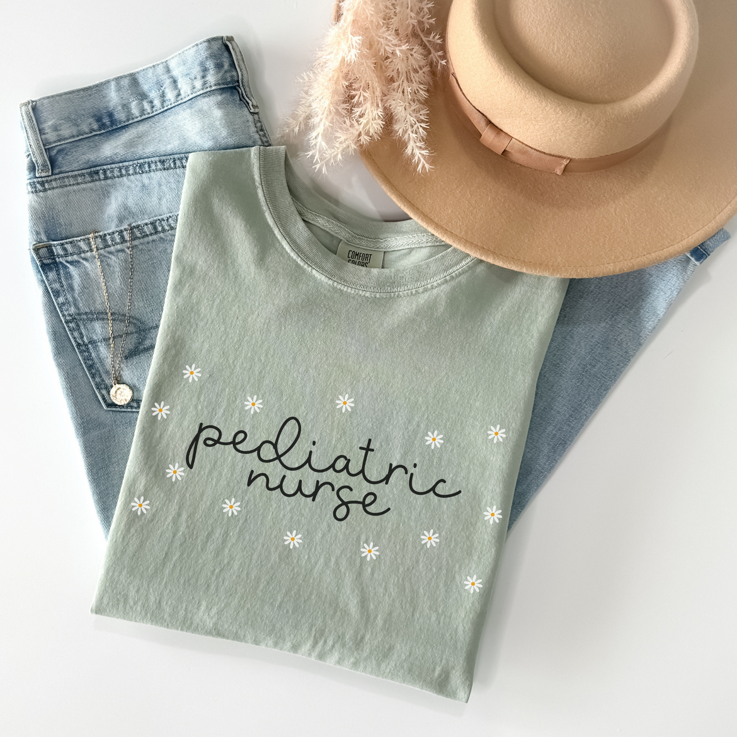 Comfort Colors® Daisies Pediatric Nurse Shirt