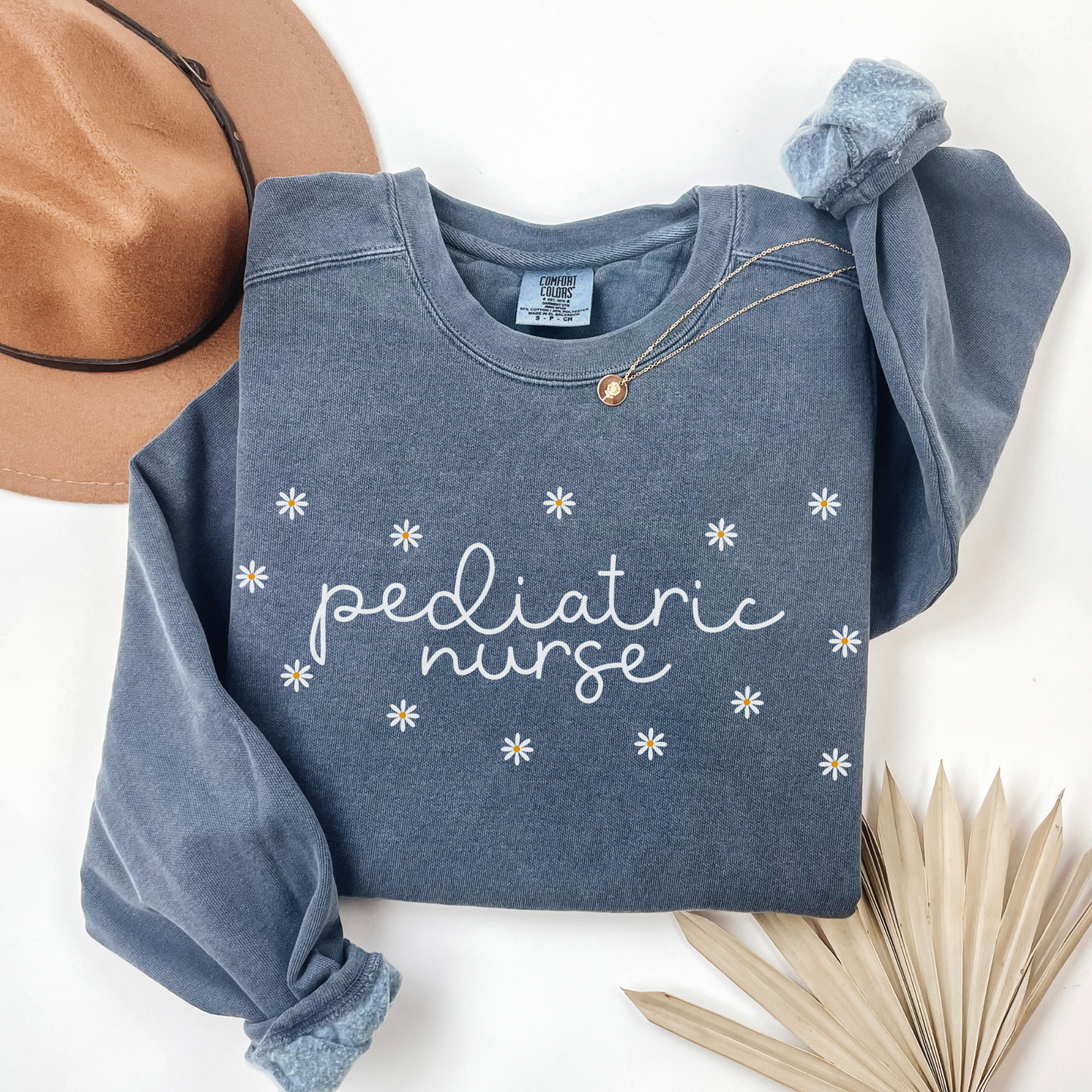 Comfort Colors® Daisies Pediatric Nurse Sweatshirt