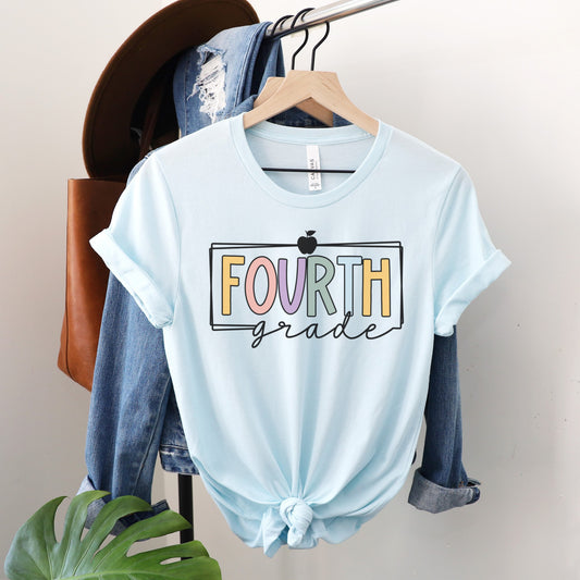 Fourth Grade Teacher Shirt Multicolor Font with apple and white border Heather Ice Blue Color