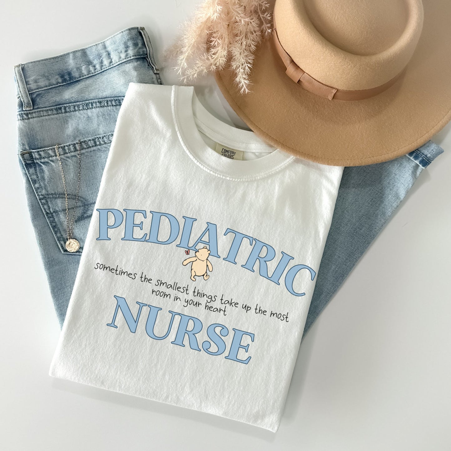 Comfort Colors® Pooh Bear Pediatric Nurse Shirt