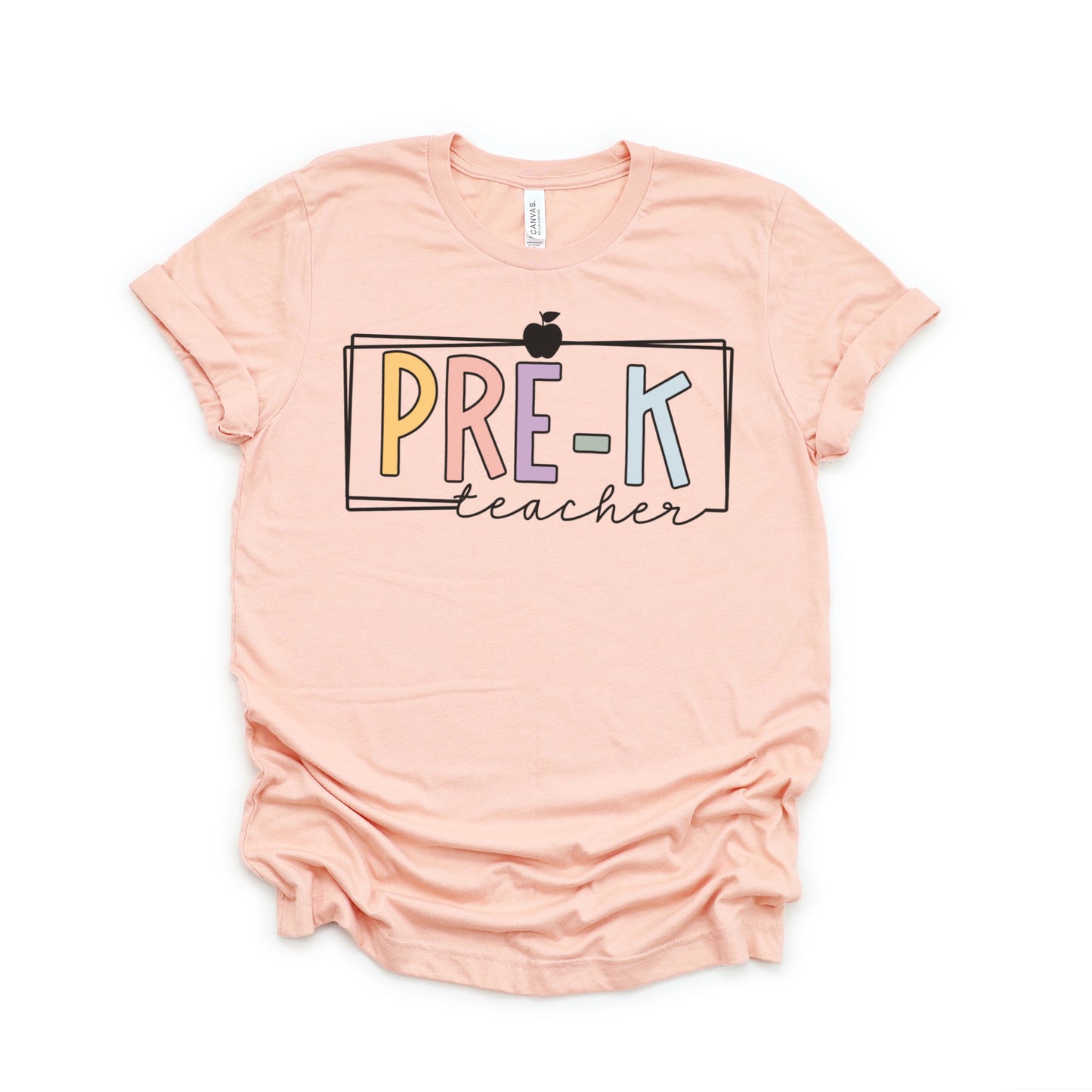 Pre-K teacher tshirt with multicolor font. White rectangle border and apple. Heather Peach Color