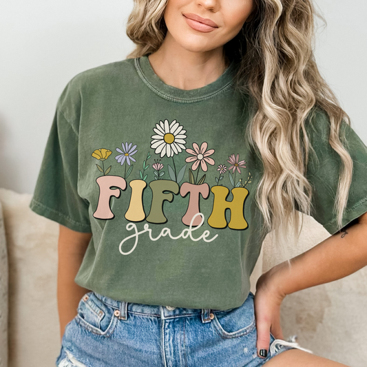 Comfort Colors® "Fifth Grade" Teacher Tshirt, Mulitcolored font with wildflowers | 1717 Unisex Color: Moss