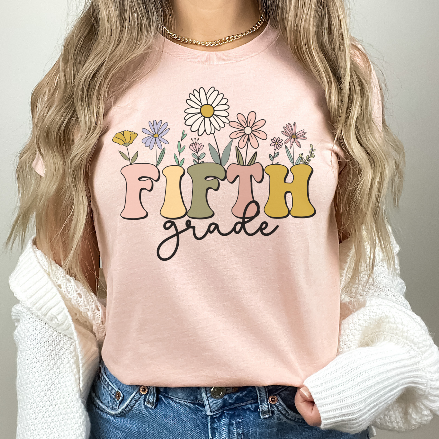 Bella Canvas 3001 Tshirt | Wildflowers "Fifth Grade" Teacher Shirt, Multicolor Font and Flowers | Color: Heather Peach