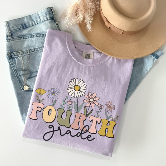 Comfort Colors® "Fourth Grade" Teacher Tshirt, Mulitcolored font with wildflowers | 1717 Unisex Color: Orchid